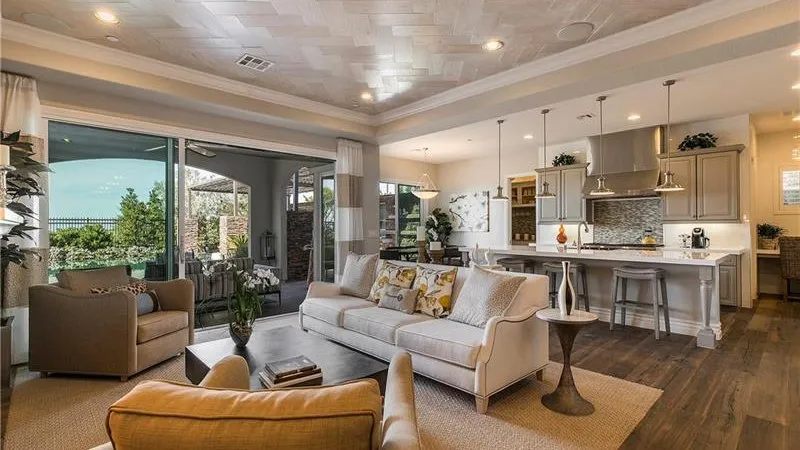 Great room and kitchen inside a Bellante home by Toll Brothers in Inspirada, Henderson NV